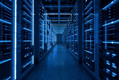 An image of a server room with blue lights.